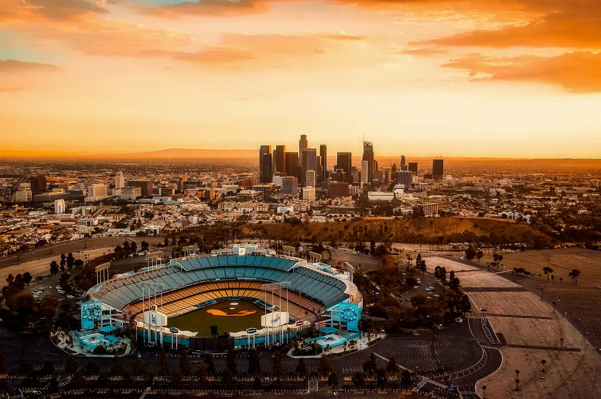 aerial view of a city with a large stadium